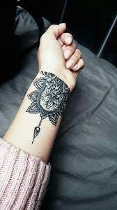 40 Awesome Wrist Tattoo Ideas For Inspiration Mandala Wrist Tattoo Wrist Tattoo Cover Up Tattoos