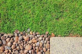 The gravel provides more drainage and solidifies the foundation. Decorative Pebbles Using As A Garden Mulch And Ground Cover