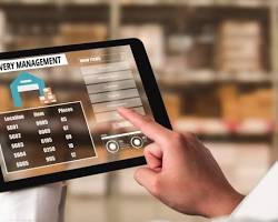 Image of person using a delivery management software