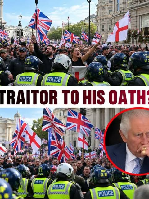 "👑 “TRAITOR TO HIS OATH?” — PROTEST OUTSIDE BUCKINGHAM PALACE SPARKS DEBATE! 🔥, A protester outside Buckingham Palace has accused King Charles of failing to uphold his oath, raising questions about ...
