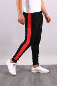 Le mannequin mesure 1m80 il porte une taille m. Jogging Homme Noir Bande Rouge 6667