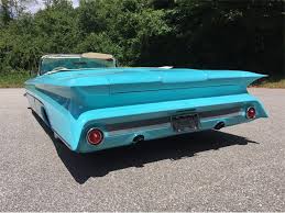 Image result for Turquoise 1960 Oldsmobile