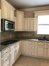 Tips refinishing or painting kitchen cabinets. Lighter Brighter Kitchen Cabinets How To Update Your Kitchen Cabinets Kitchen Cabinets Before And After New Kitchen Cabinets Glazed Kitchen Cabinets