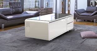 A futuristic coffee table with tempered glass top welcome to wowelo you've just found the greatest online store for most of your needs.browse our website and stay tuned to our social media for great discount opportunities. This Futuristic Coffee Table Has Bluetooth Speakers And A Refrigerated Drawer