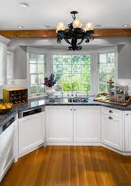Check spelling or type a new query. A Bay Window At One End Of This Cabinetry Countertop Cuisine Classique Interior Design Kitchen Ro Kitchen Remodel Small Kitchen Renovation Kitchen Remodel