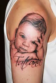 Typically, baby portrait tattoos are a great way to keep a permanent picture of your beloved baby with you forever. 40 Adorable Ideas Of Tattoos With Kids Names Baby Tattoo Designs Names Tattoos For Men Baby Tattoos