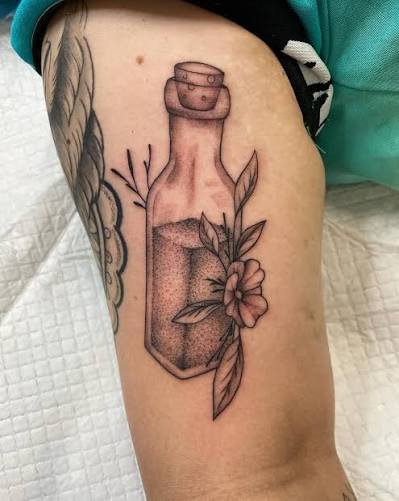 Fine line potion bottle done by @byrubydesigns ✨⚡️🧪 Looking to get tattooed before Christmas break? Message us to book in!
