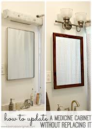 This is basically the medicine cabinet's version of a kangaroo pouch: How To Update A Medicine Cabinet Without Replacing It Bathroom Medicine Cabinet Mirror Bathroom Mirror Cabinet Medicine Cabinet Mirror