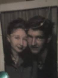 1965. An 18-year-old Johan Cruyff working as a clothing store salesman.