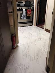 Trafficmaster Carrara Marble 12 In X 24 In Peel And Stick Vinyl Tile 20 Sq Ft Case Ss1212 The Home Depot Vinyl Tile Marble Vinyl Peel And Stick Vinyl