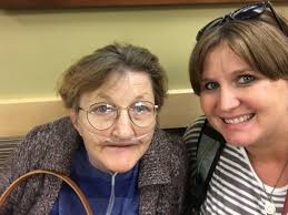 Removing a balloon from an obituary photo