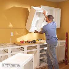 Replacing old cabinets is an expensive undertaking but is much more affordable if you do the installation yourself. How To Install Kitchen Cabinets Diy Family Handyman