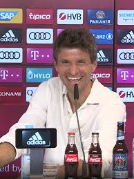 But his attempt at a joke left the assembled media unamused. International Press Conference With Thomas Muller