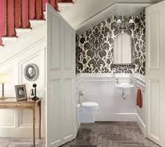 Five Ideas For Using The Space Under A Stairwell Bathroom Under Stairs Traditional Bathroom Tiny Powder Rooms