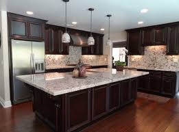 Likable Alaska White Granite Dark Cabinets Brown Kitchen Cabinets Kitchen Design Dark Kitchen Cabinets