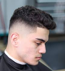 This fade haircut cut entirely marries grungy and sleek aesthetics. 15 Best Coronavirus Quarantine Haircuts For Men