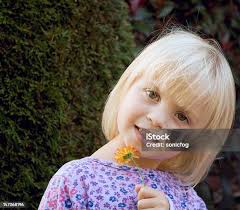 Girl With Flowers Stock Photo