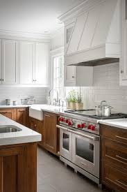 white upper cabinets with brown lower