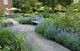 Accessible Family Garden Design In West Sussex With Breed On Gravel Path And Bench In Border Family Garden Garden Design Gravel Garden
