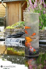 La Tour A Poisson Un Observatoire Pour Vos Bassins La Tour A Poisson 50 Est Une Tour En Acrylique Qui Vous Permett Fish Tower Pond Design Fish Ponds Backyard