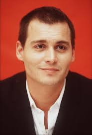 Johnny depp during a press conference for donnie brasco 1997 Johnny was  filming fear and loathing at the time hence the buzz cut (he was growing  his hair back)