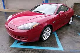 Image result for Bright Silver 2000 Tiburon
