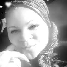 Can someone please help me by removing the Chinese menu poster from the  right of my father's head ? Thank u