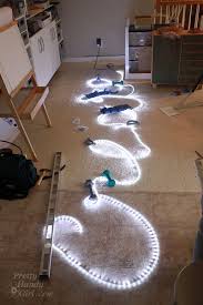 Make that space functional by lining the ceiling or floor with a rope light. How To Create Rope Light Word Wall Art