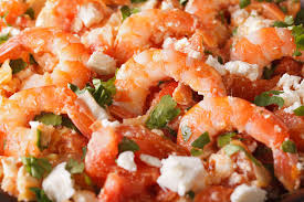 Una ricetta sfiziosa perfetta per un antipasto. La Ricetta Gamberi Saganaki Per Voi