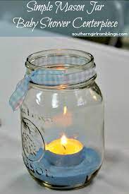 Simple Mason Jar Baby Shower Centerpiece From Mom S Desk Mason Jar Baby Shower Baby Shower Centerpieces Baby Boy Shower