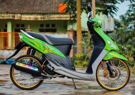Jumlah penggemar modifikasi di tanah air amat sangat besar, tentu saja hal ini membuat permintaan modifikasi motor biar tampak lebih unik & menarik dipandang. Modifikasi Mio Road Race Drag Airbrush Tahoilook Terkeren