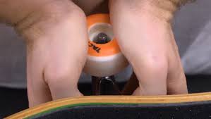 Insert your bearings into your wheels. How To Build A Skateboard Tactics