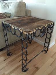 End Table Made Out Of Horseshoes And Barn Boards See More At Http Www Goodshomedesign Com Diy Horseshoe Crafts Projects Horseshoe Decor Horseshoe Projects