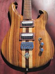 Handmade Wood Electric Guitar Zebrawood Top By Inbloomdesigns Electric Guitar Custom Electric Guitars Guitar