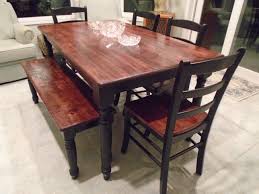Rustic Farmhouse Table Brown Stained Top Black Painted Legs 4 Black Chairs Brown Stained Seats 1 Black Kitchen Table Rustic Kitchen Tables Farmhouse Table