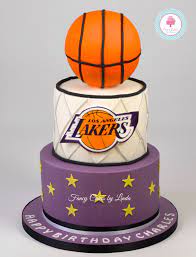 The backboard was made with gum paste and left to dry for several days. Basket Ball La Lakers Themed Birthday Cake 07917815712 Www Fancycakesbyl Www Facebook Com Fancy Basketball Cake Childrens Birthday Cakes Birthday Party Cake