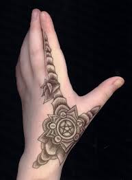 Spiked mace tattoo on the hand. Personable Hands Tattoo Design 2020