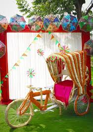 Photo Of Colourful Mehendi Photobooth With Decorated Rikshaw Mehendi Decor Ideas Indian Wedding Decorations Beautiful Wedding Decorations