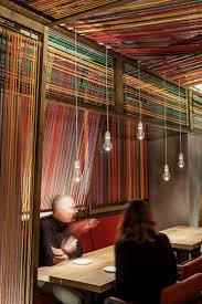 Colorful Ropes Line The Walls And Ceiling Of This Restaurant Bar Design Restaurant Restaurant Pictures Restaurant Interior