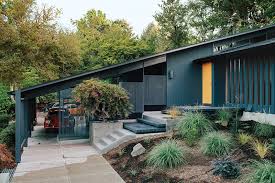 From the 1930s to the mid 1960s, a new design movement was sweeping the country. Midcentury Renewal Portland Black Exterior Gold Front Door