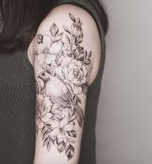 Feminine tattoo symbols popular among women include flowers, butterflies, or cherry blossoms, etc. Bellbird With Flowers By Tritoan Ly Bird Tattoo Sleeves Cardnial Tattoo Colour Tattoo For Women