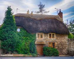 Thatched cottage with Jack and Jill...