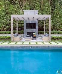 Swimming Pool Ideas The Poolside Pergola Features A Samsung Outdoor Television Sofas And Ottomans B Trendyideas Net Your Number One Source For Daily Trending Ideas