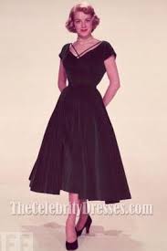 Touch device users, explore by. Rosemary Clooney Dark Green Velvet Cocktail Dress In White Christmas 1954 Velvet Cocktail Dress Green Cocktail Dress Green Velvet Dress