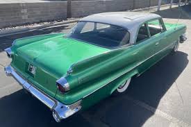 Image result for Teal 1960 Dart