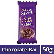 Browse 320 cadbury dairy milk stock photos and images available or search for cadbury chocolate to find more great stock photos and pictures. Cadbury Dairy Milk Silk Bubbly Chocolate Bar 50 G Amazon In Grocery Gourmet Foods