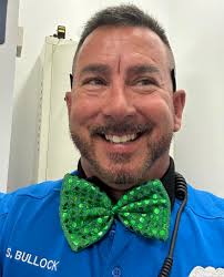 SRO Bullock teaching our Tiller School kids how to do St. Patrick's Day  right!