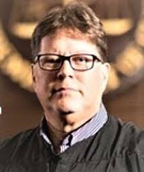 Judge disqualifies himself from ex-mayor's informant's case