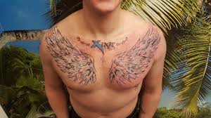 Check spelling or type a new query. Angel Wings Chest Tattoo Meaning And Designs Body Tattoo Art