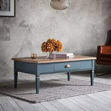 The most common blue coffee table material is cotton. The Atlantic Range 1 Drawer Coffee Table Blue Grey